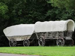 Covered wagons similiar to those you find in Conestoga Campground Utah.